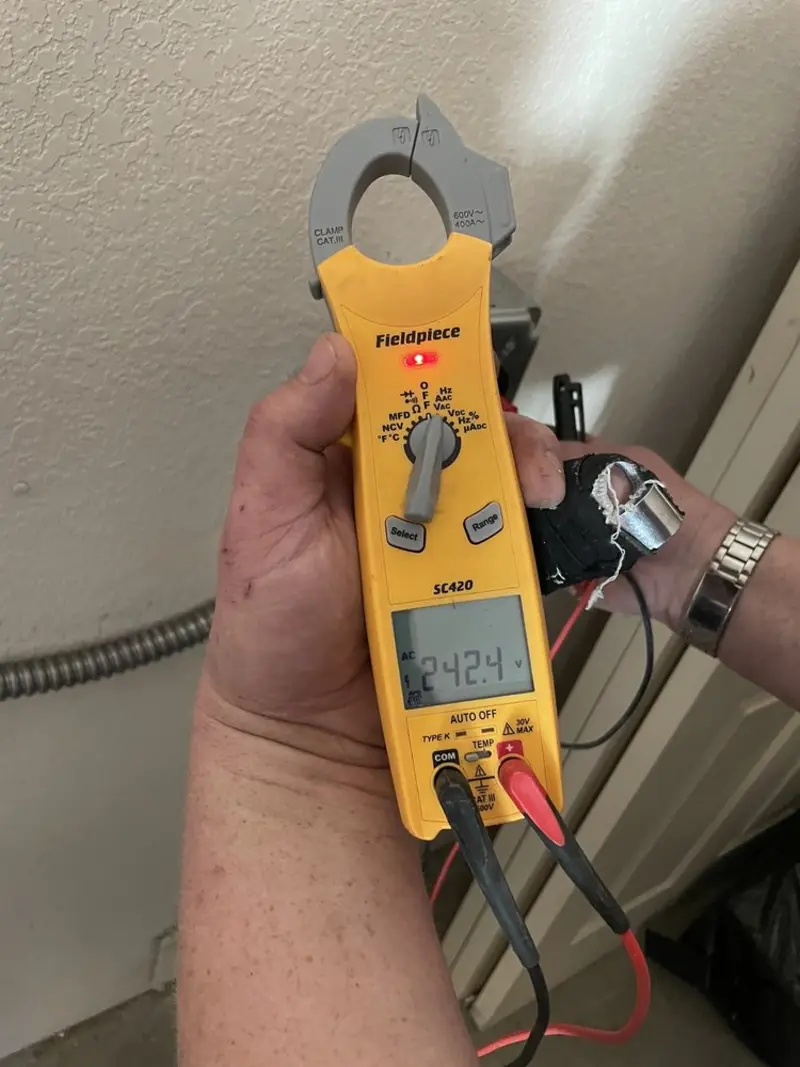 Voltage testing with clamp meter during Hot Tub / Pool Electrical Wiring in Concord